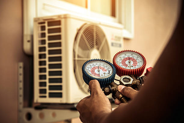 Professional Air Conditioning Service technician working in Jackson, MN